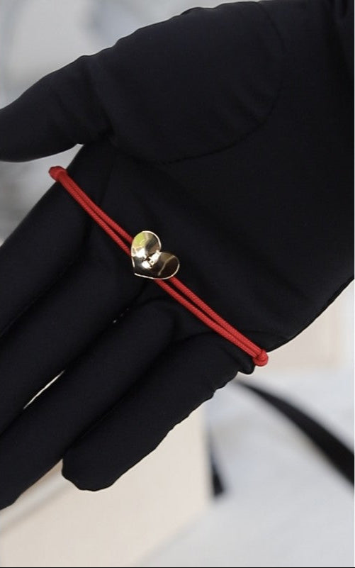 Pulsera cordón corazón elevado oro 18kt
