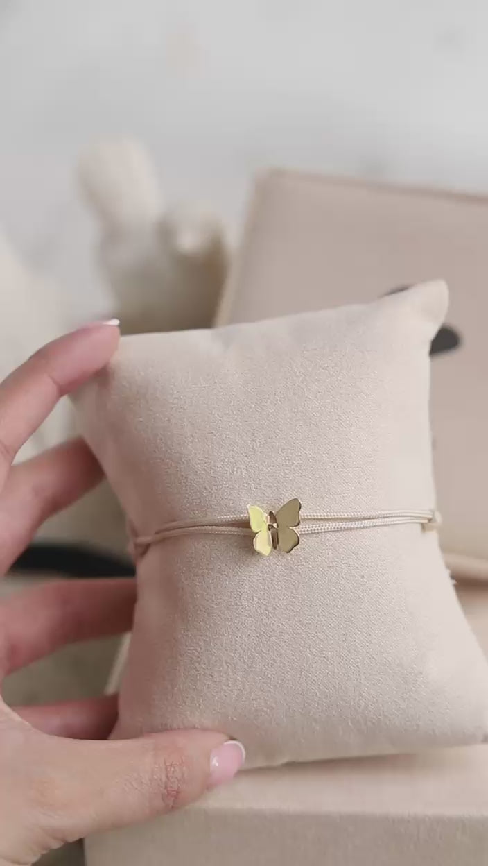 Pulsera cordón mariposa en el aire Oro 18kt