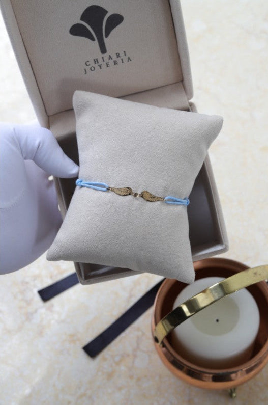 Pulsera cordón alas de ángel Oro 18kt